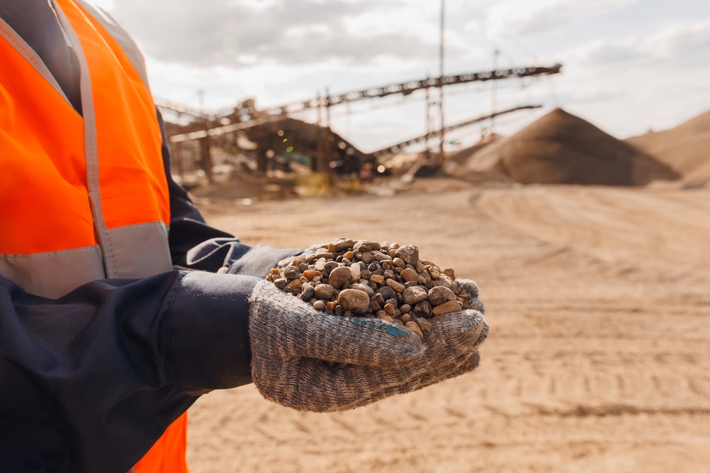 Worker,Engineer,Hold,Gravel,In,Hand,,Checks,Quality,At,Sand Worker,Engineer,Hold,Gravel,In,Hand,,Checks,Quality,At,Sand